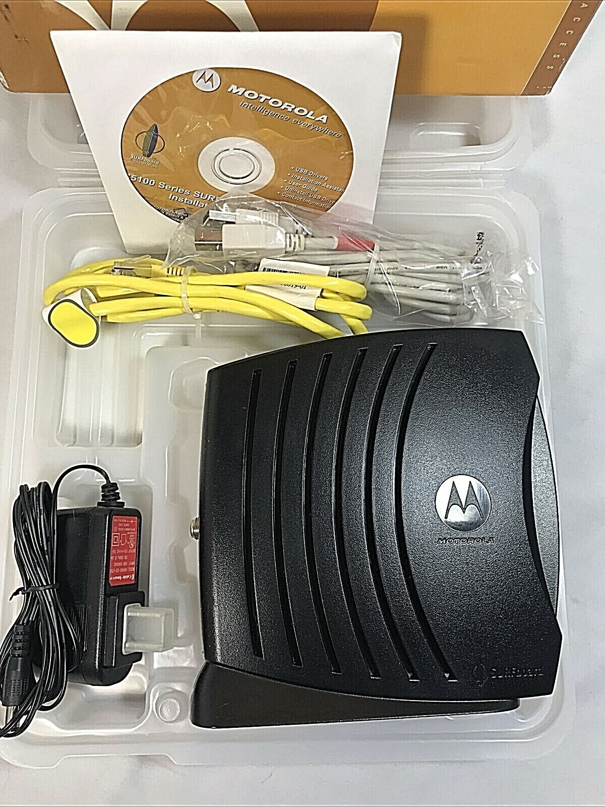 Motorola SURFboard SB5100 Cable Modem 500887-025-00 AC Adapter CD Disk Bundle