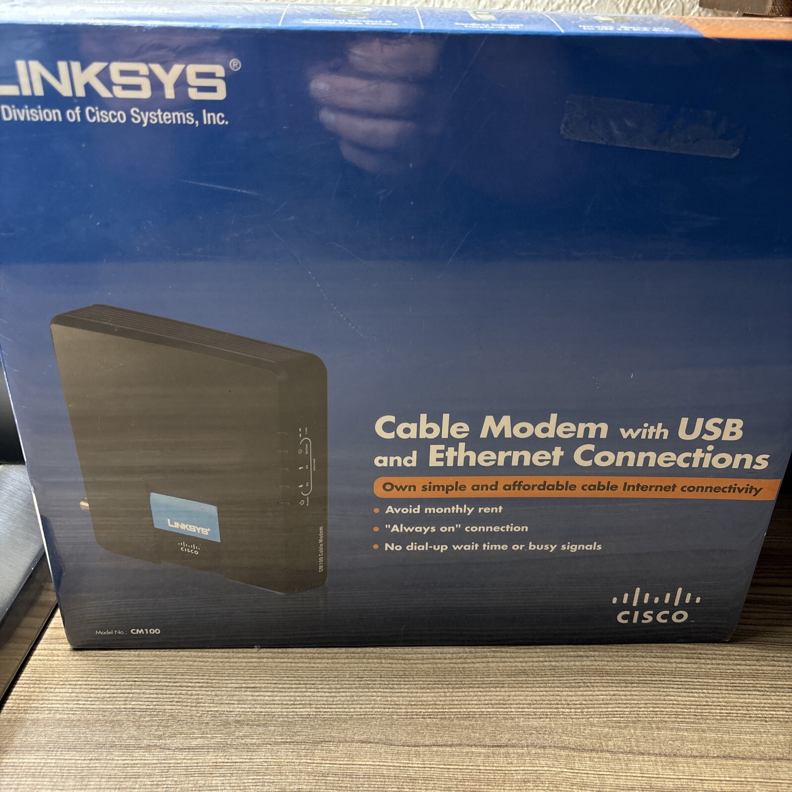 Cisco-Linksys Cable Modem Model CM100 (New – Factory Sealed) USB & Ethernet Conn