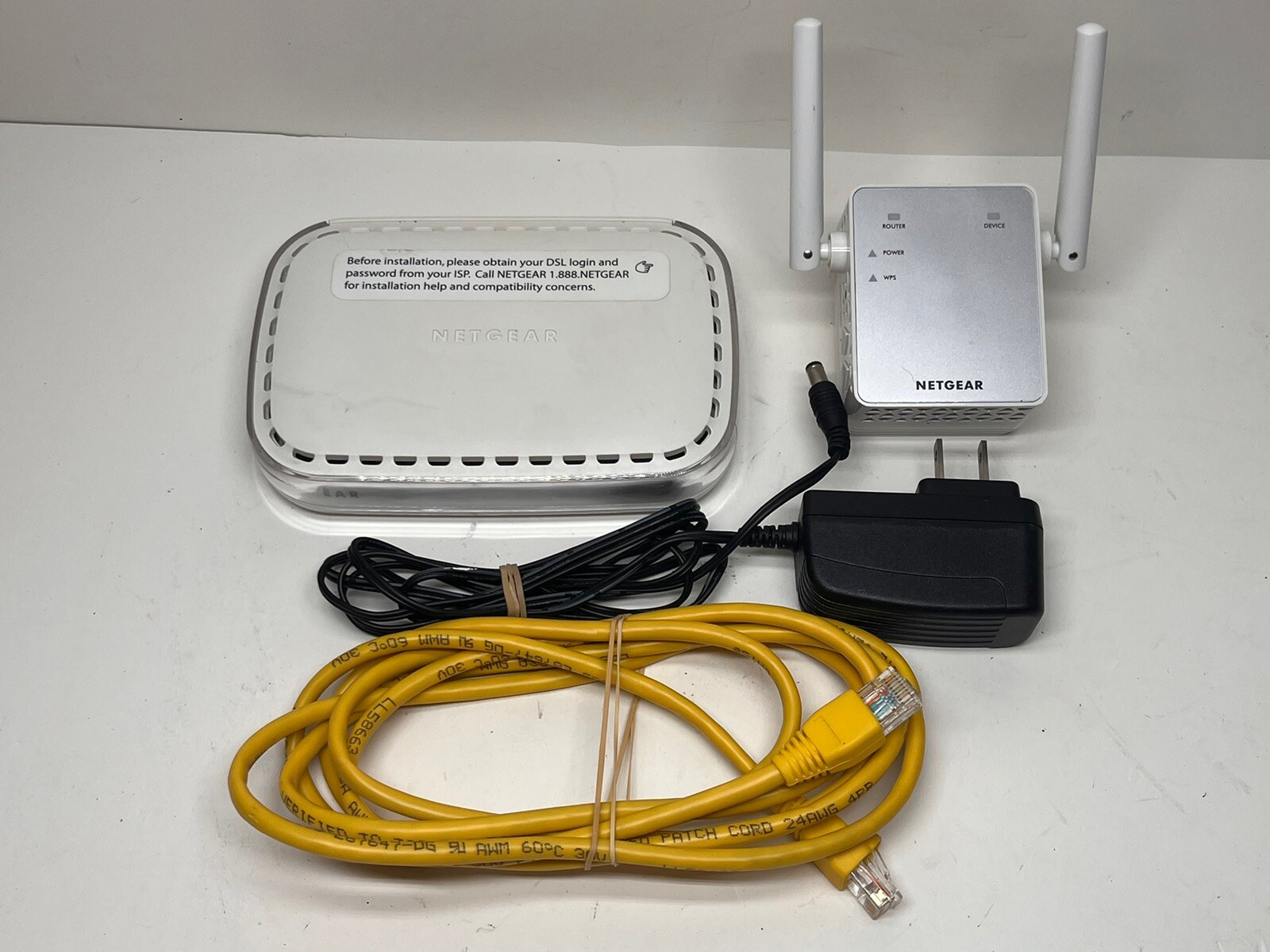 NETGEAR Broadband ADSL2+ Modem | DMP111PSP v2 + NG Wifi Range Extender AC750