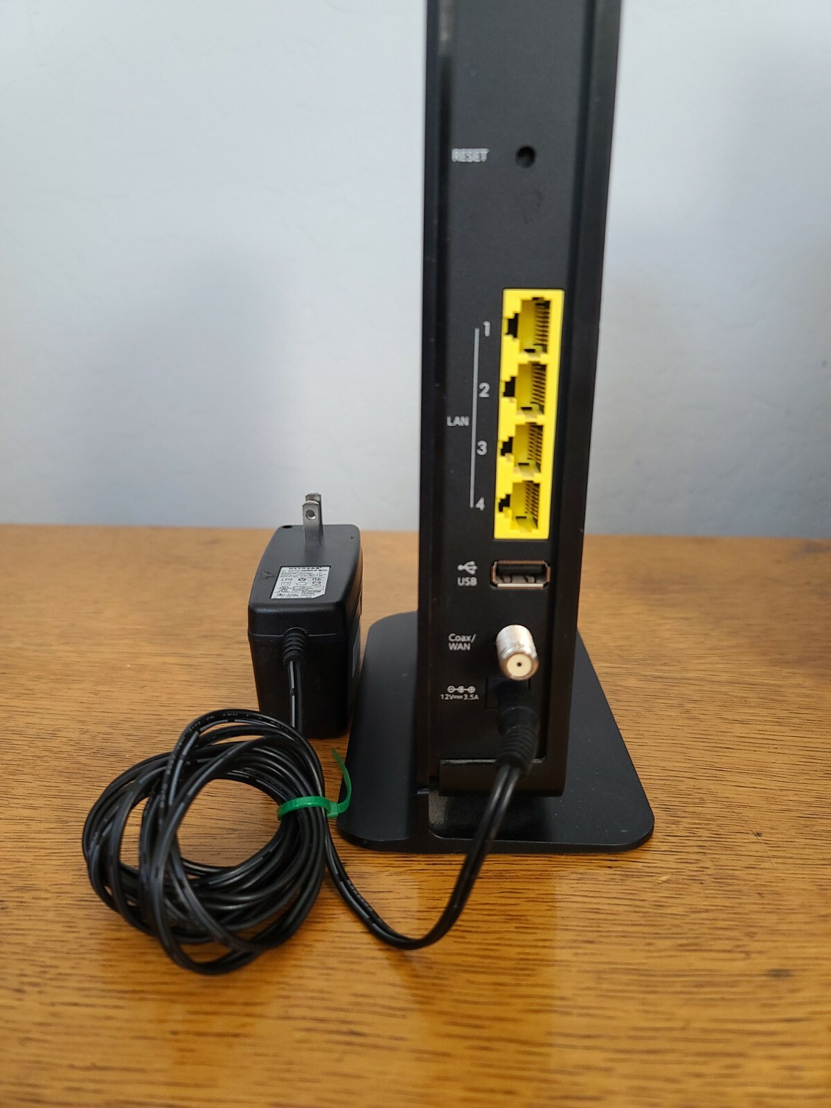 The NETGEAR AC1900 C6300BD is a cable modem router that provides high-speed