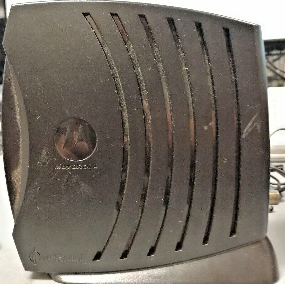 Motorola SB5101U Cable Modem With a 0LEI T481208OO3CT Power Supply 12.0VDC 750mA