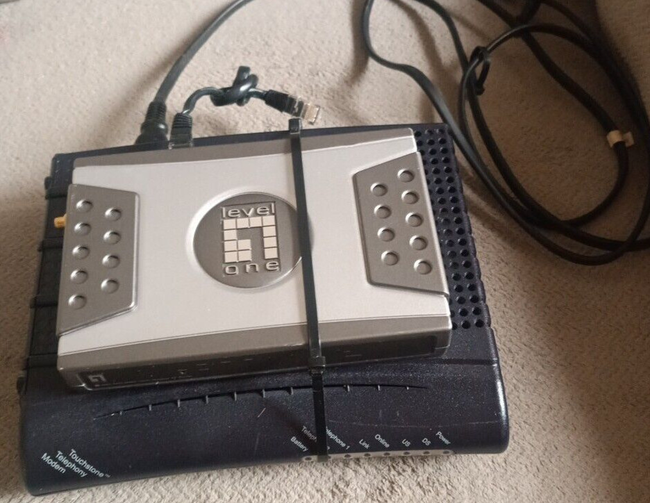 Arris TM502G + Level One WBR-5400 /312