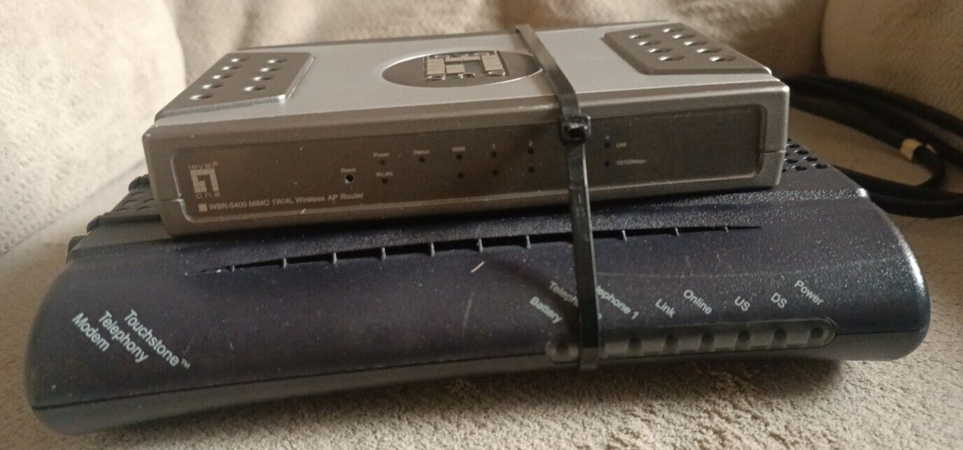 Arris TM502G + Level One WBR-5400 /312