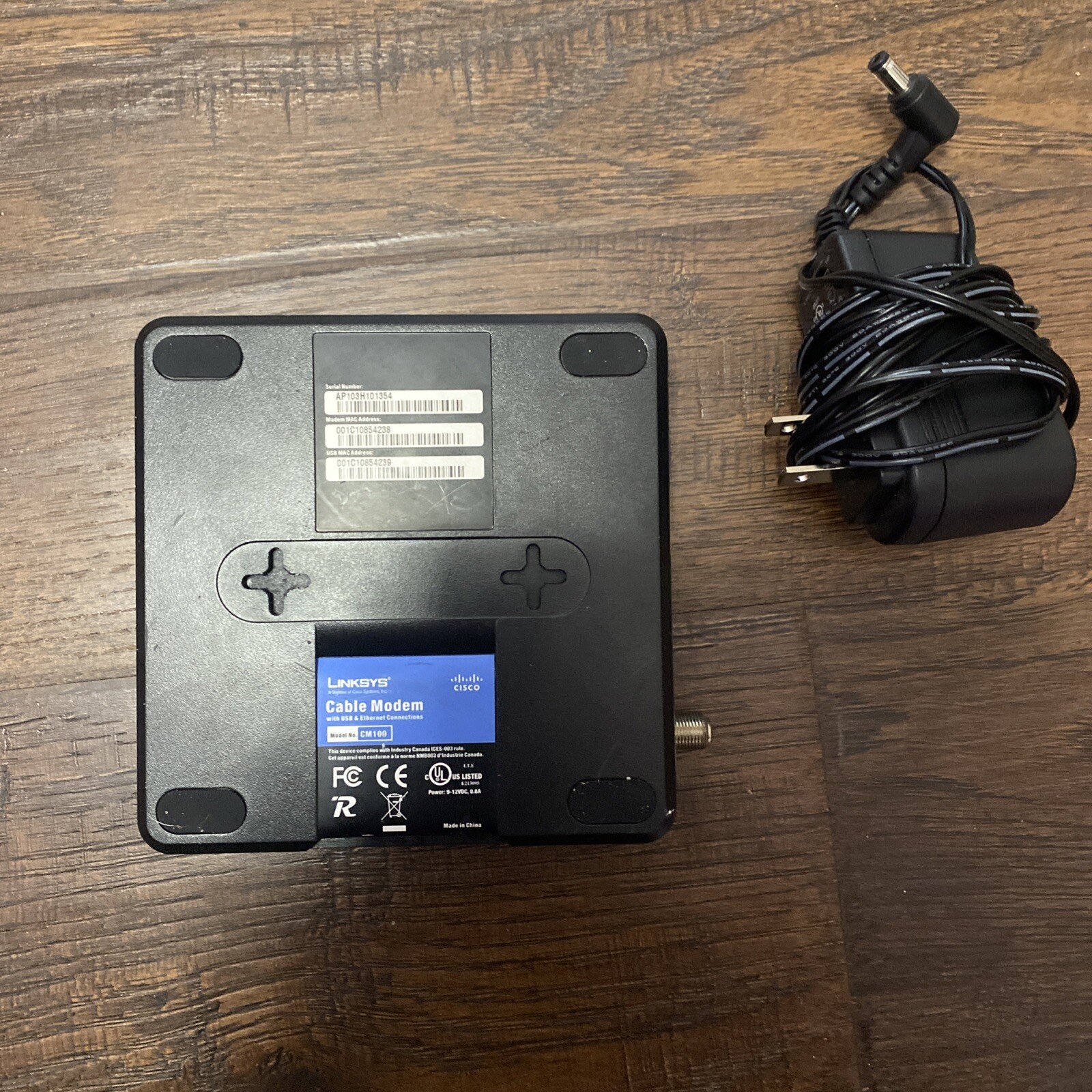 Linksys CM100 100 Mbps Cable Modem with USB, Coax and Ethernet Connections RG-6