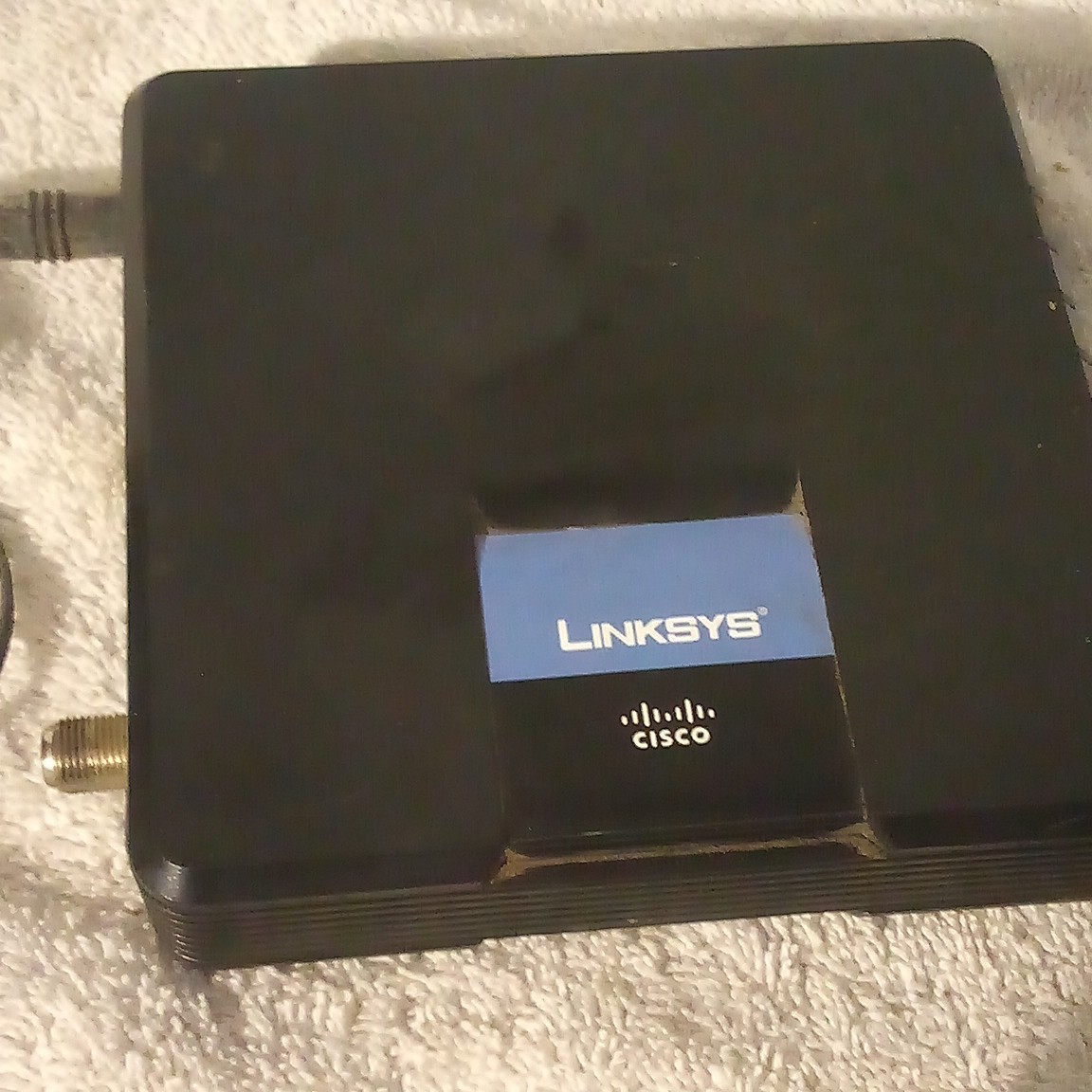Linksys CM100 DOCSIS 2.0 Cable Modem 100 Mbps USB/Ethernet Black AD12V/1A-SW